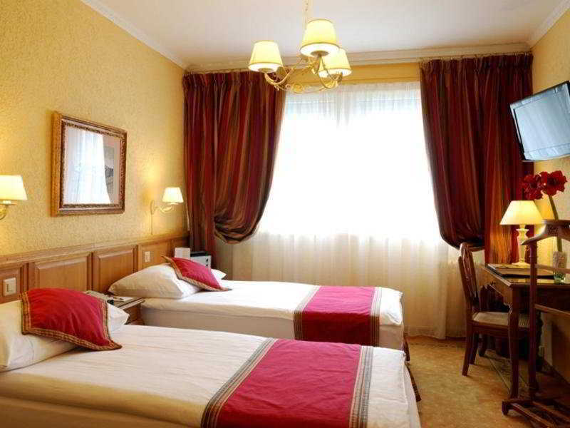 Hotel Les Nations Женева Номер фото